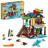LEGO 31118 Creator 3-in-1 Surfer-Strandhaus, mit Leuchtturm, Poolhaus, Tier-Figuren wie Delfin und Schildkröte, inkl. 2 Minifiguren, kreatives Spielzeug ab 8 Jahren, Geschenk für Mädchen und Jungen